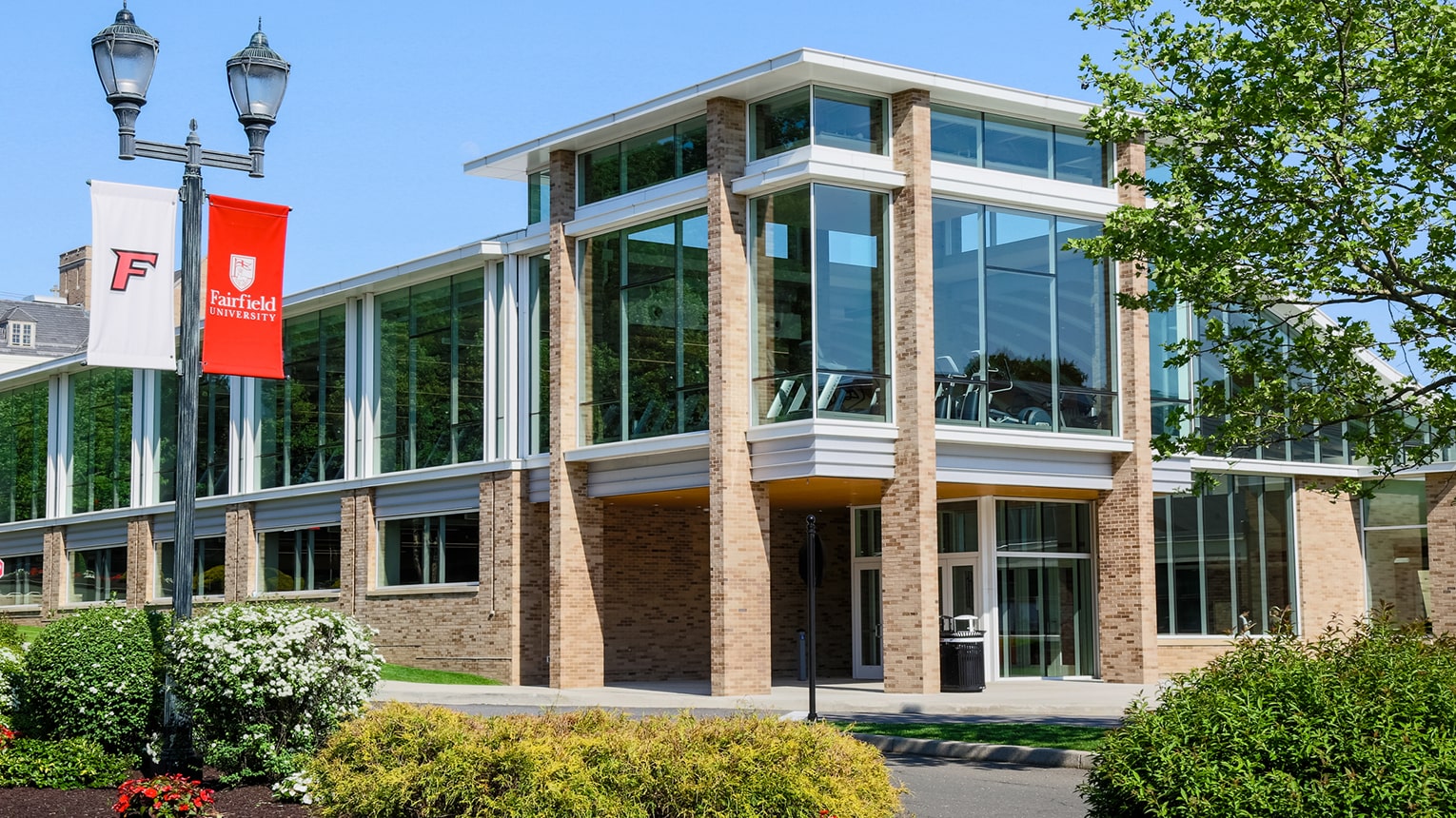 The Recreational Complex at Fairfield University, highlighting its prominent structure and the greenery around it.  